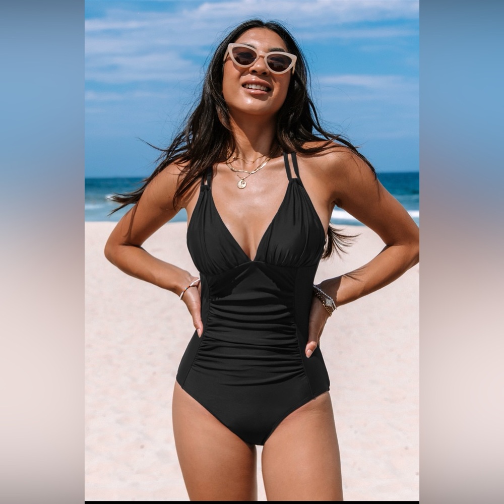 NWT…Sexy Black Strappy One piece Size M